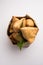 SamosaÂ Snack is an Indian deep fried pastry with a spiced filling usually made with potatoes, spices and herb